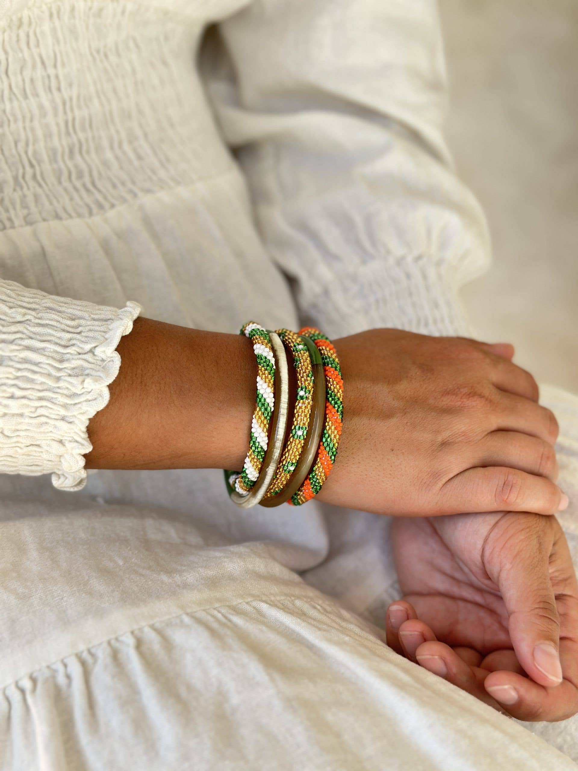 Bracelet népalais orange vert doré torsadé