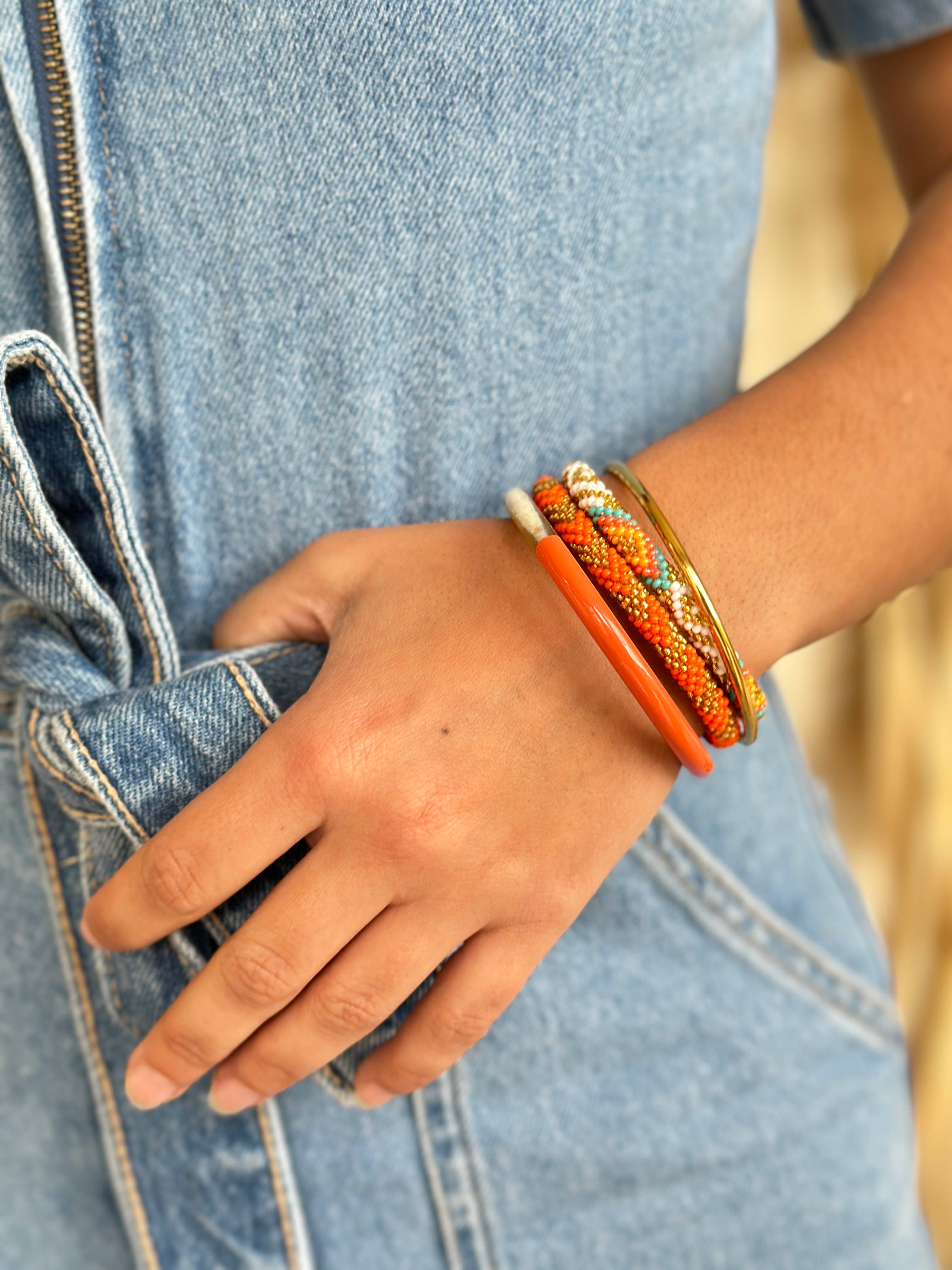 Bracelet népalais A20 orange doré flèche