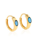 Boucles d'oreilles créoles en topaze bleue de Londres plaquées or 14K sur argent.
