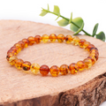 BRACELET BOULE 06MM AMBRE MIEL AA