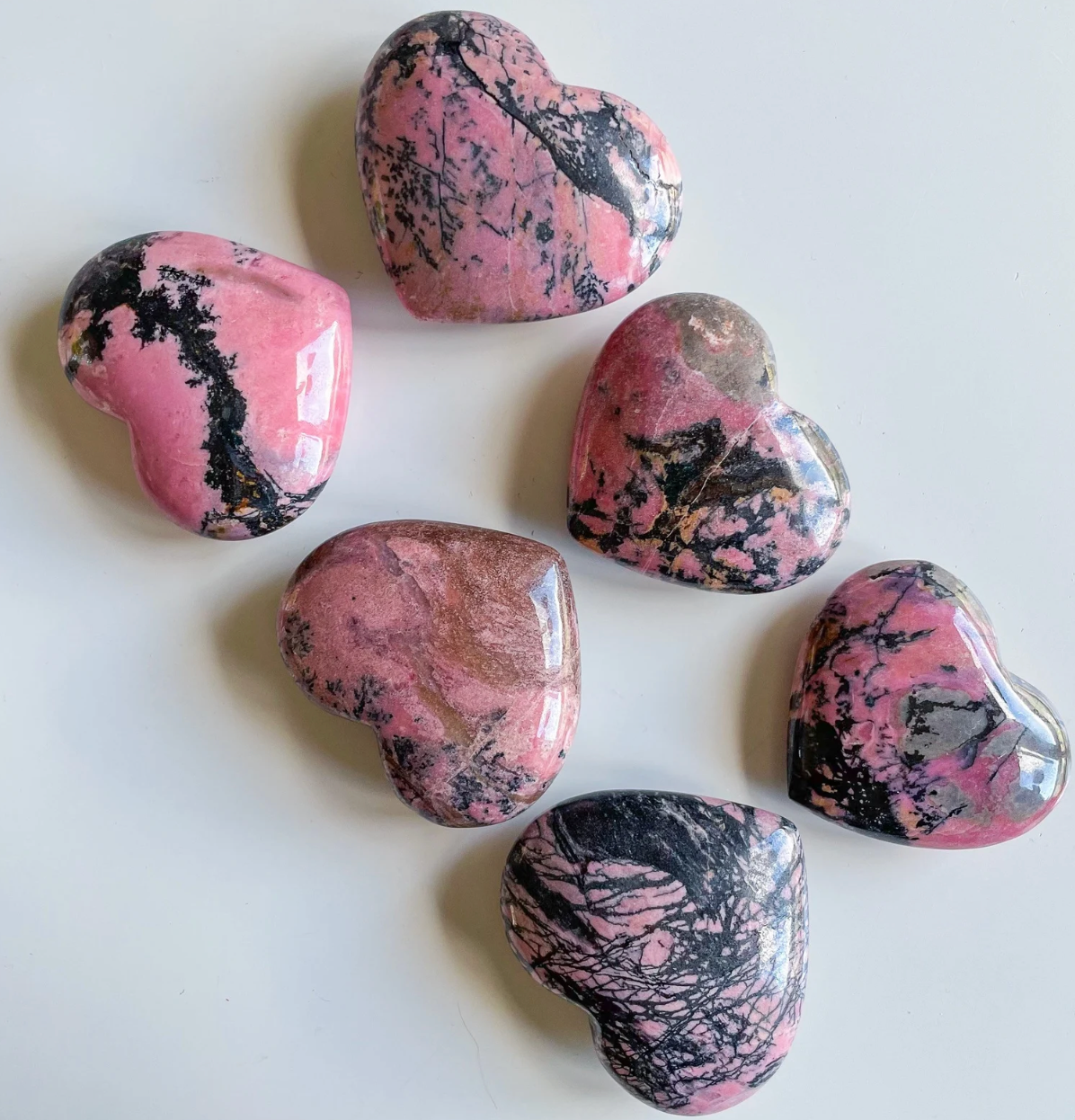 Galet coeur 20 a 30mm Rhodonite Madagascar AB (1 pièce)