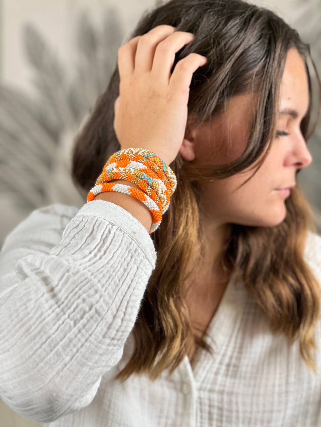 Bracelet népalais A20 orange doré flèche