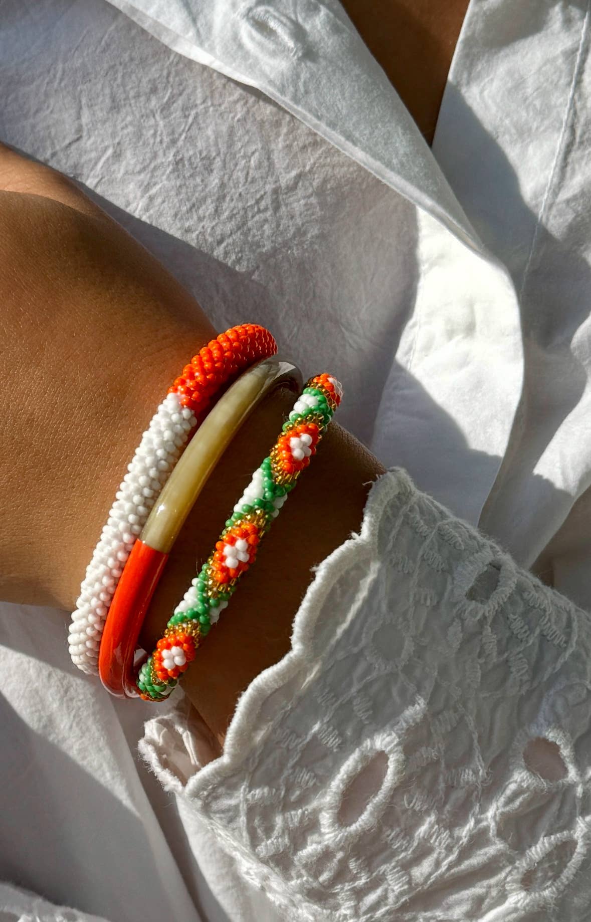 Bracelet népalais orange et blanc